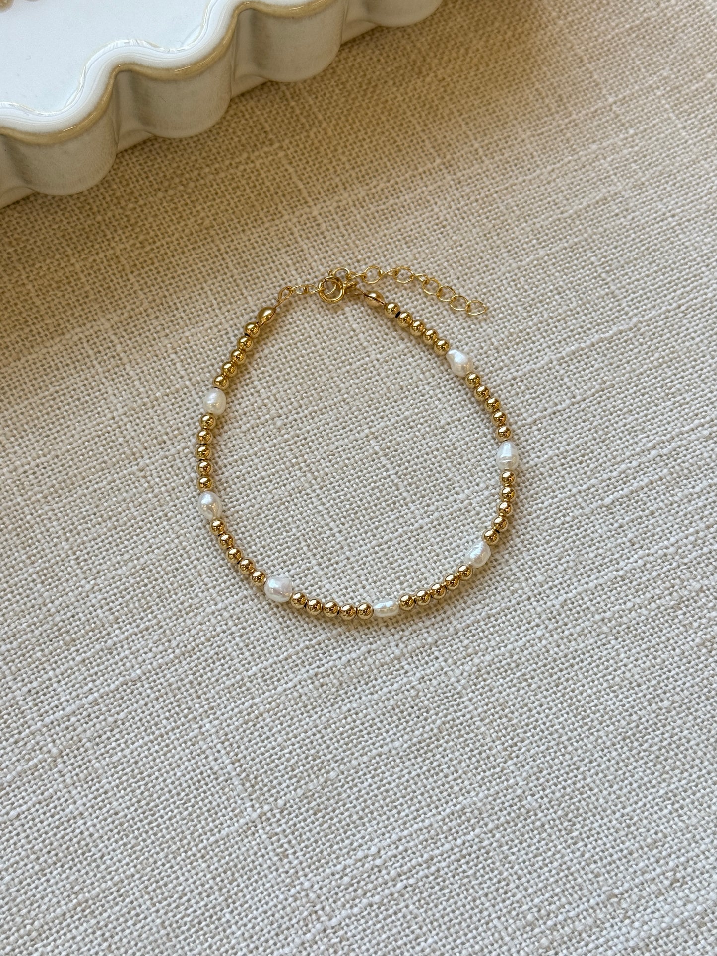 Amira pearl gold beaded bracelet