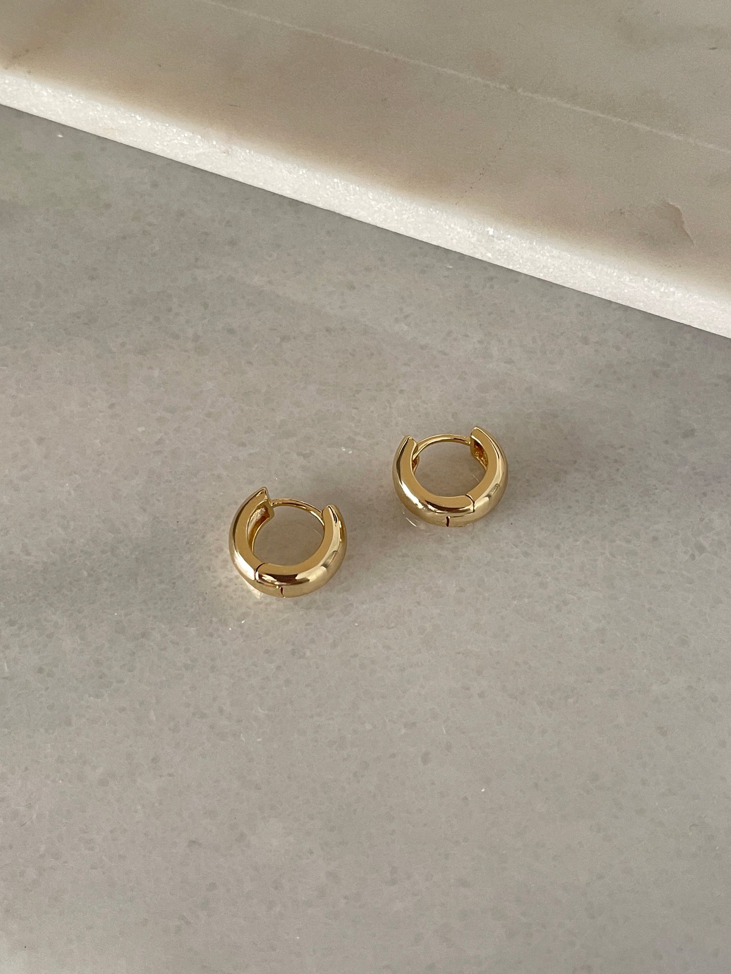 Leomie huggie earrings