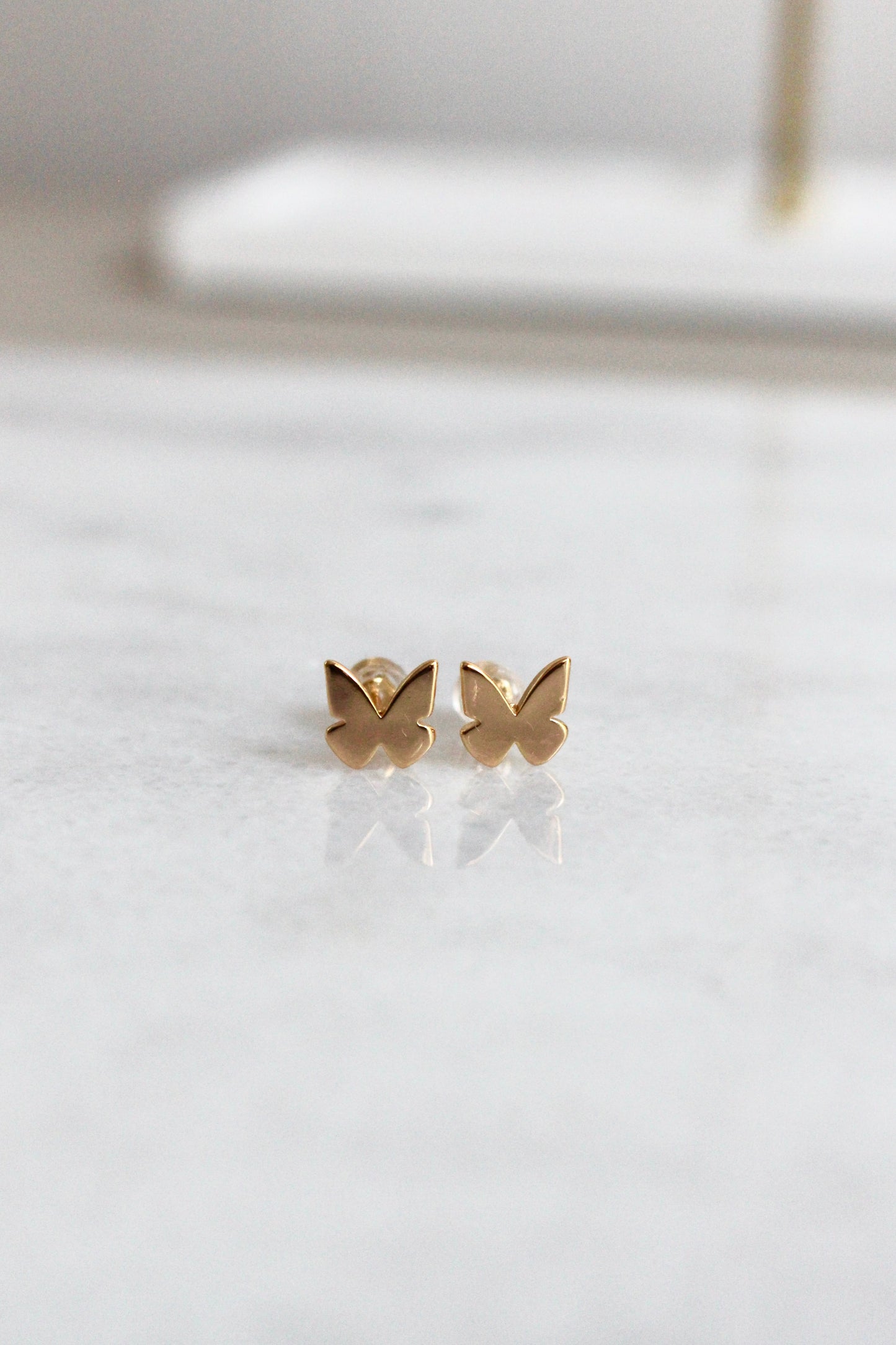 Simple butterfly stud earrings