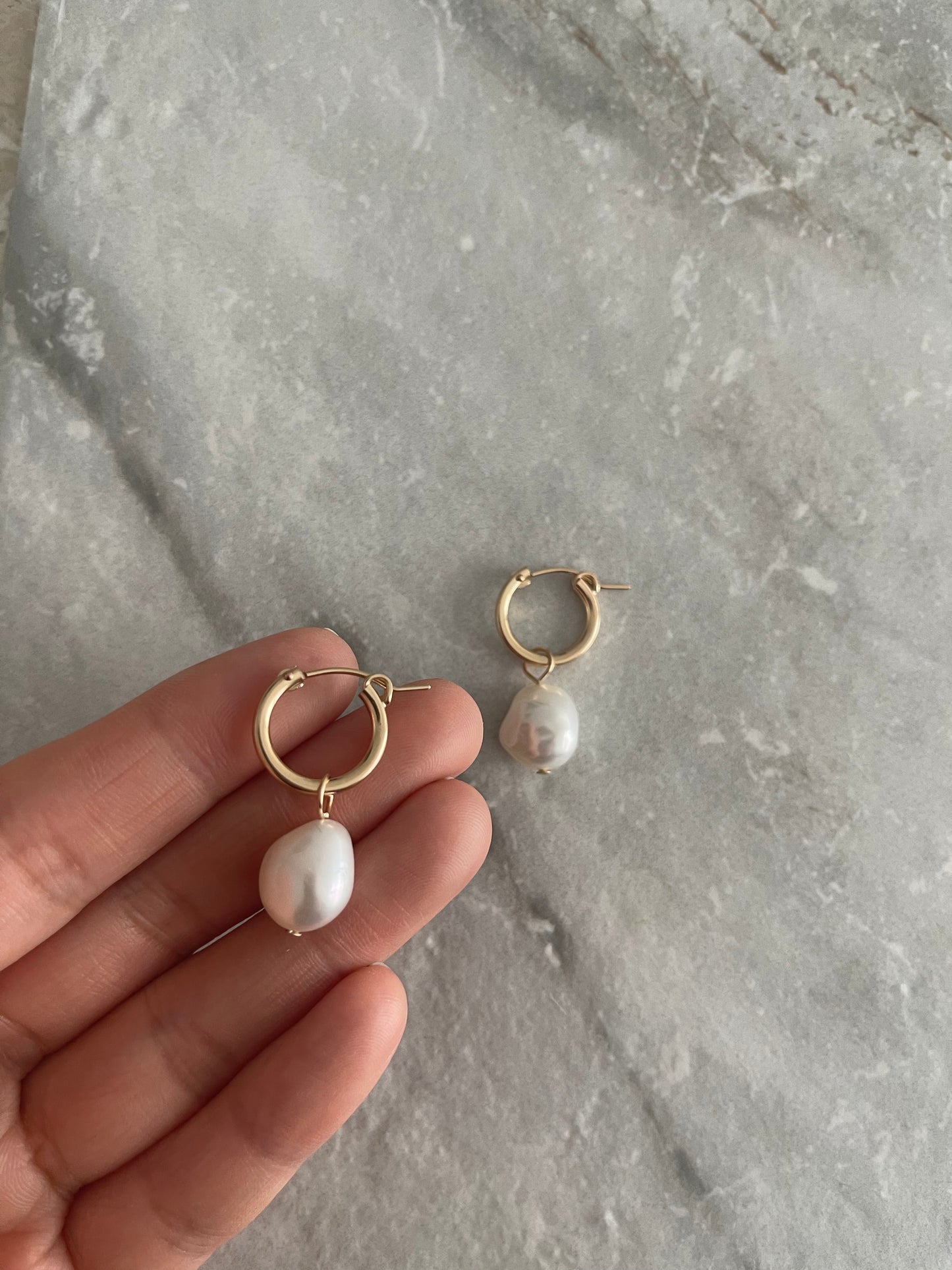 Large pearl earrings
