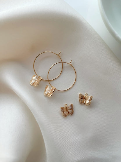 Butterfly gold hoop earrings